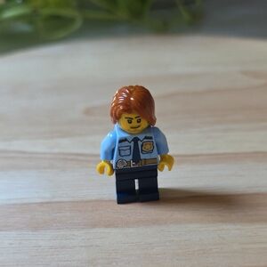 LEGO Police Minifigure with Blue Shirt and Red Hair